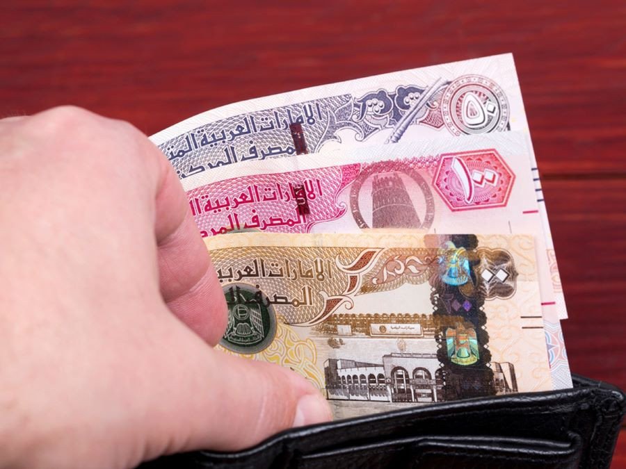 Cận cảnh những đồng tiền Dirham UAE, đồng tiền chính thức của Dubai.
