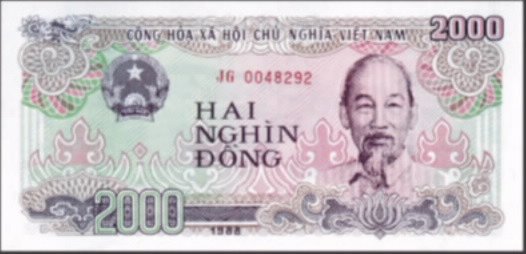 Hình ảnh tiền 2.000 đồng cotton của Việt Nam, mặt sau là cảnh xưởng dệt