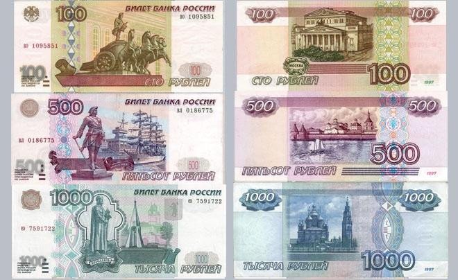 Tiền giấy Rúp Nga với mệnh giá 100, 500 và 1000 Rúp