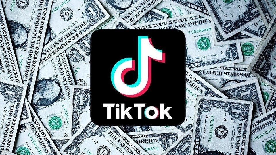 Giá Trị Thực 0.04 USD Bằng Bao Nhiêu Tiền Việt Nam Trên TikTok? Hình ảnh mô phỏng khoản thanh toán 0.04 USD cho mỗi 1000 lượt xem trên TikTok, thể hiện cách các nhà sáng tạo nhận thu nhập.