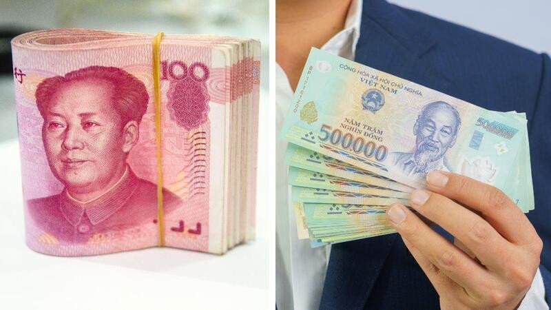 Người đang tính toán quy đổi tiền Trung Quốc sang tiền Việt